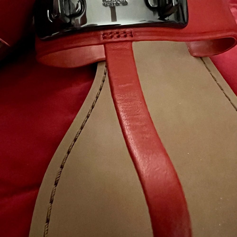 Coach Gracie Swagger Orange-Rust Orange Turn Lock Leather T Strap Sandals. - Picture 3 of 14